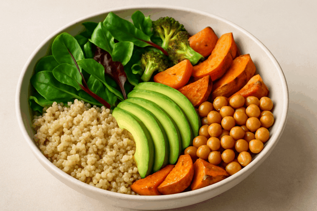 How a Whole Foods Diet Supports Sustainable Weight Loss: Expert Tips for Eating Whole Foods to Lose Weight Safely 1 Colorful grain bowl with quinoa, avocado, chickpeas, leafy greens, and roasted vegetables representing a balanced whole foods diet.